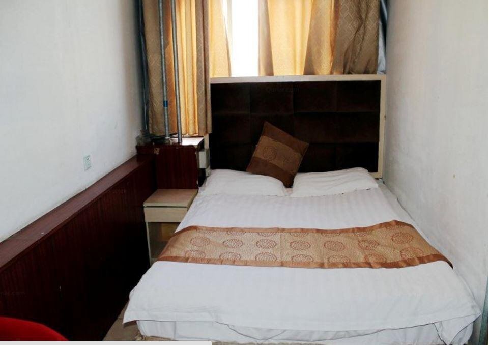 Лиаоченг: Liaocheng Chiping Jinda Business Hotel