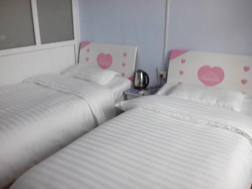 Чанчжи: Changzhi Happy Inn