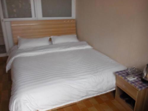 Чанчжи: Changzhi Happy Inn