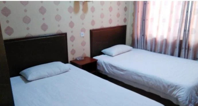 Баодин: Jinyuan Business Inn