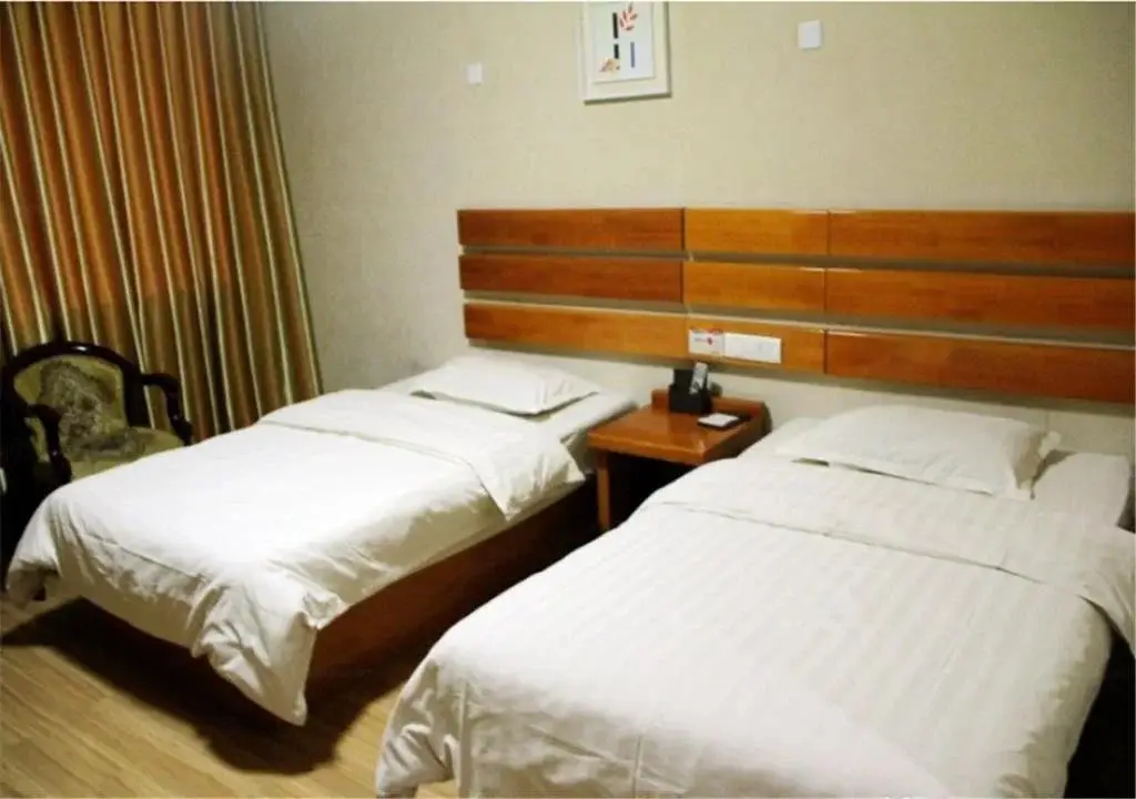 Лиаоченг: Jiatai Business Hotel