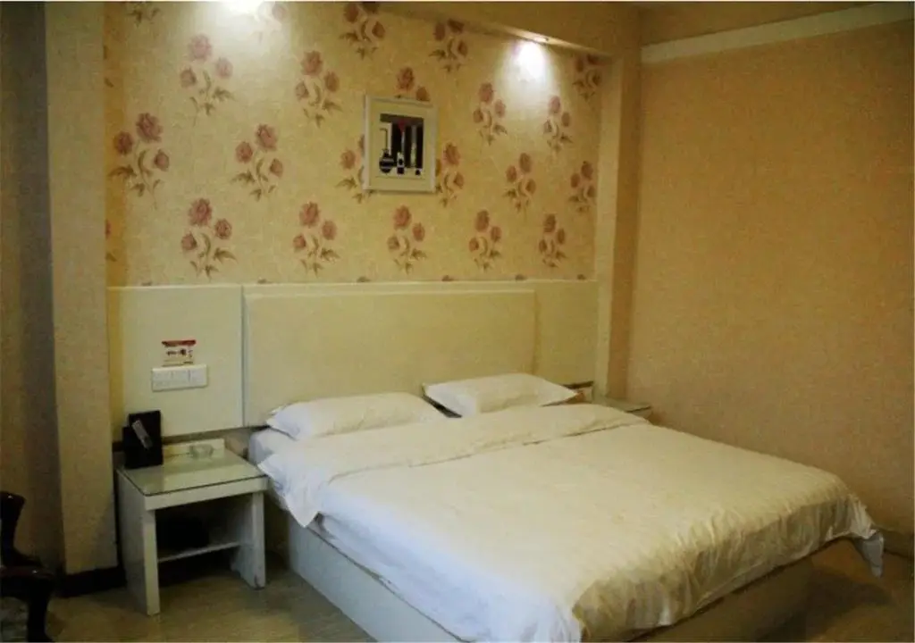 Лиаоченг: Jiatai Business Hotel