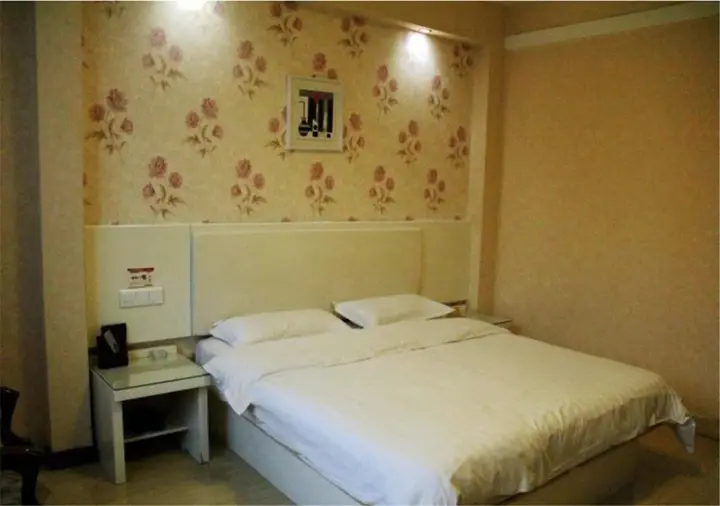 Лиаоченг: Jiatai Business Hotel