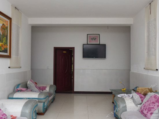 Лешан: E'meishan Gou'ermei Homestay