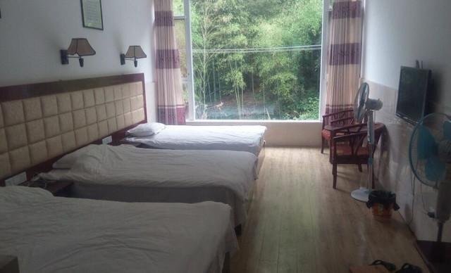 Лешан: E'meishan Gou'ermei Homestay