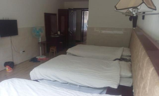 Лешан: E'meishan Gou'ermei Homestay