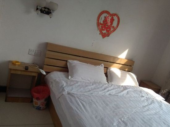 Хецзе: Shanxian Anjie Business Hotel
