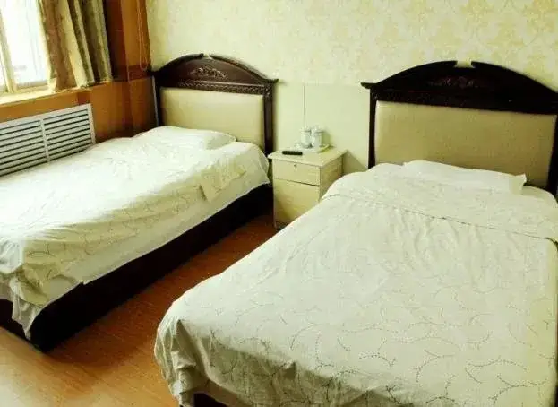 Лиаоченг: Juxian Business Hotel