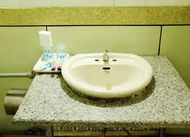 Лиаоченг: Juxian Business Hotel