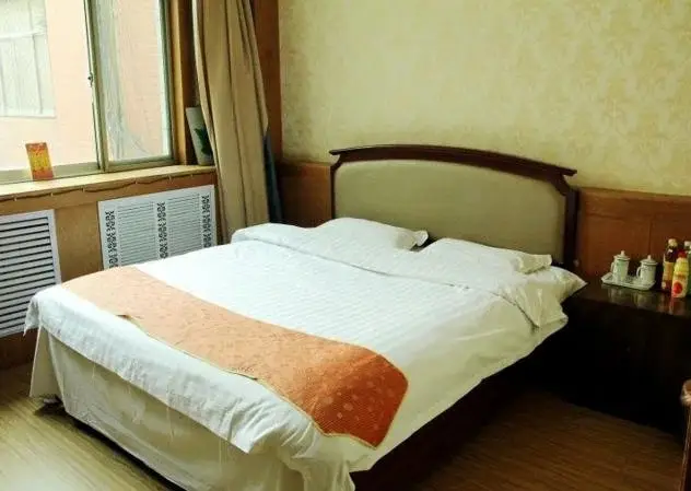 Лиаоченг: Juxian Business Hotel