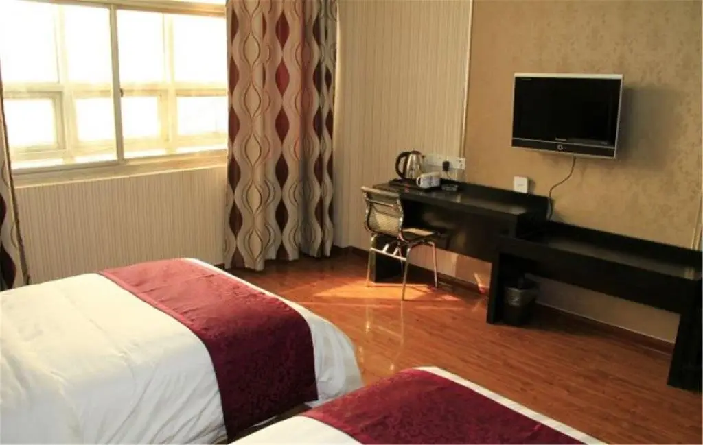Хецзе: Heze E Home Business Hotel