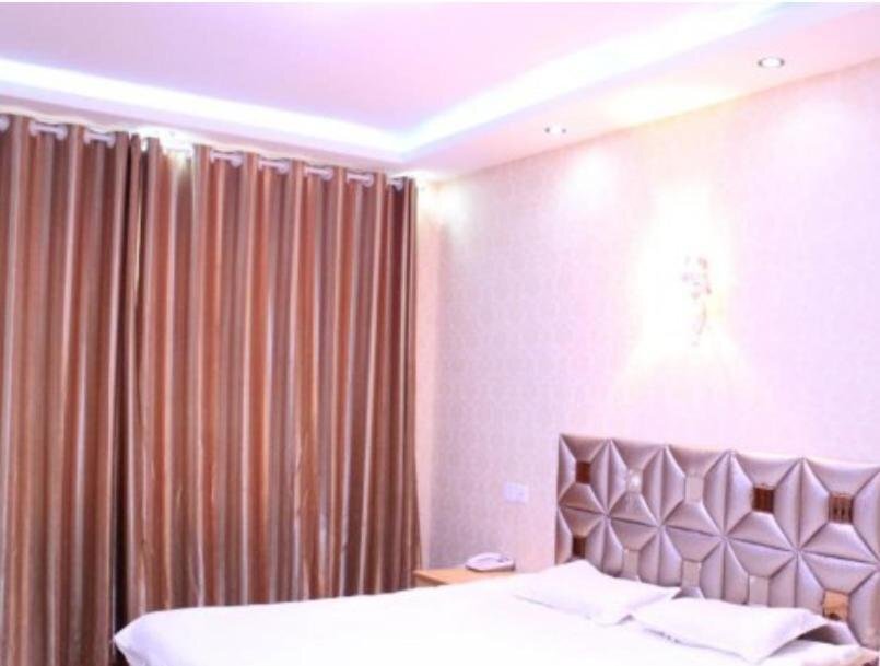 Линьи: Linshu Mingman Business Inn
