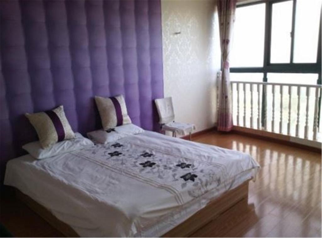 Циндао: Qingdao Zhanqiao Tinghai Lijing Apartment