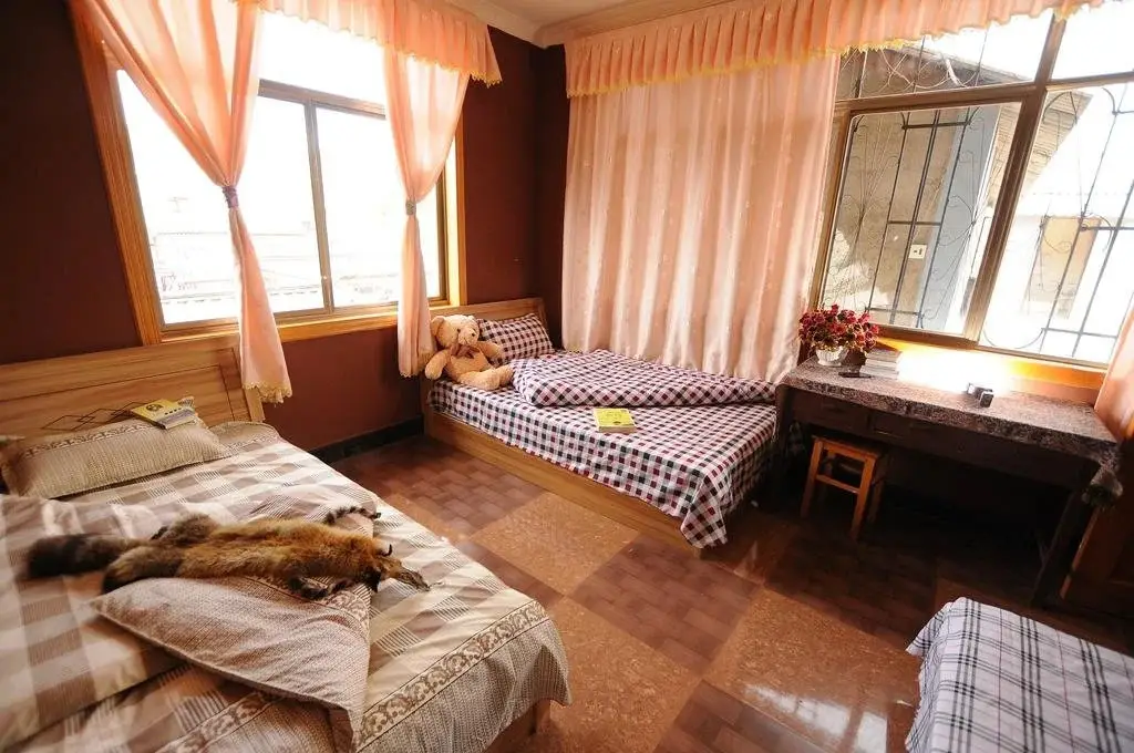 Лицзян: Xianrenkongfang Hostel Lijiang