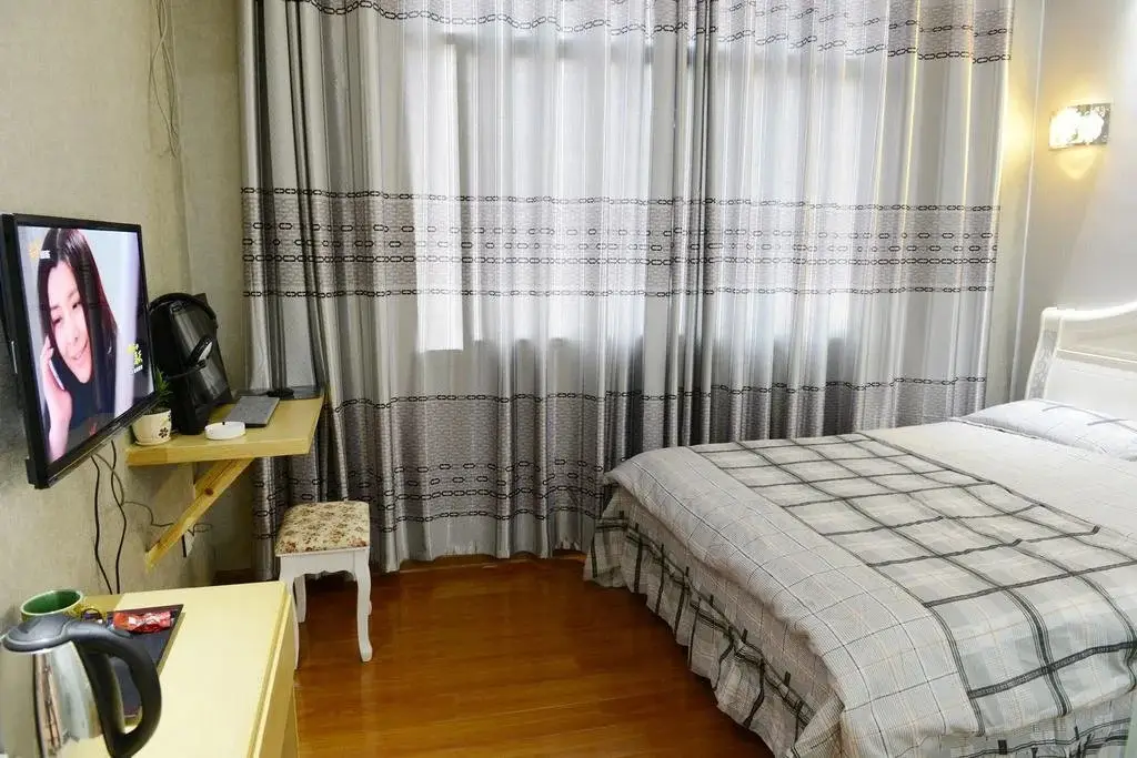Чжанцзяцзе: Aiqinhai Fashion Hotel