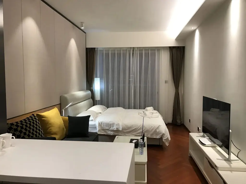 Шэньчжэнь: Shengang Executive Apartment Shenzhen