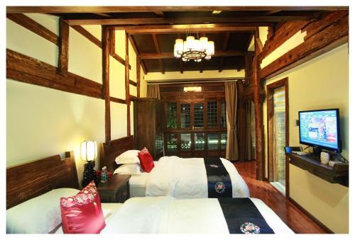 Лицзян: Yiyunju Homestay