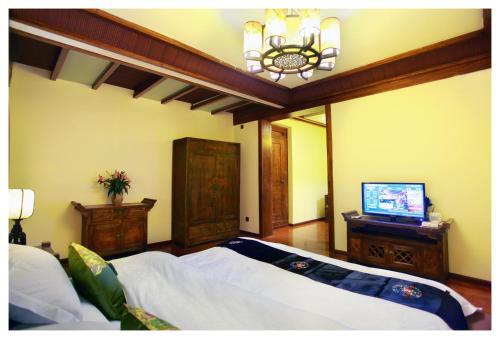 Лицзян: Yiyunju Homestay