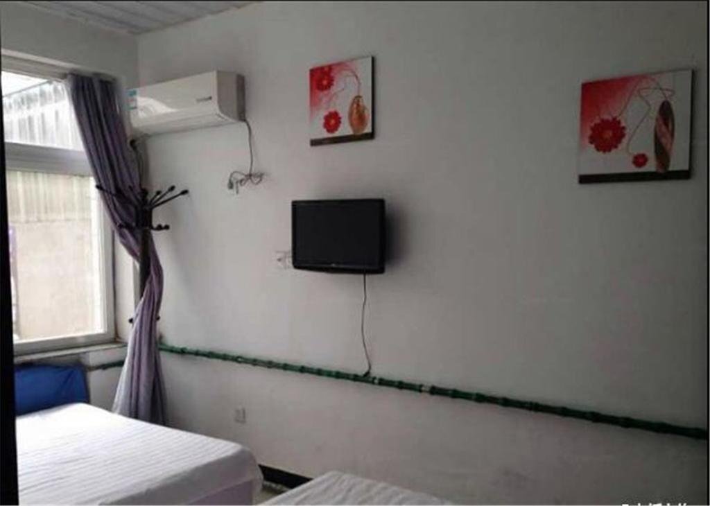 Хулудао: Huludao Xingcheng Red Sun Inn