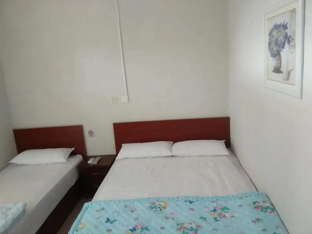 Жичжао: Sunshine fishing music Ren Jia Tai Cun Lan Su Hotel