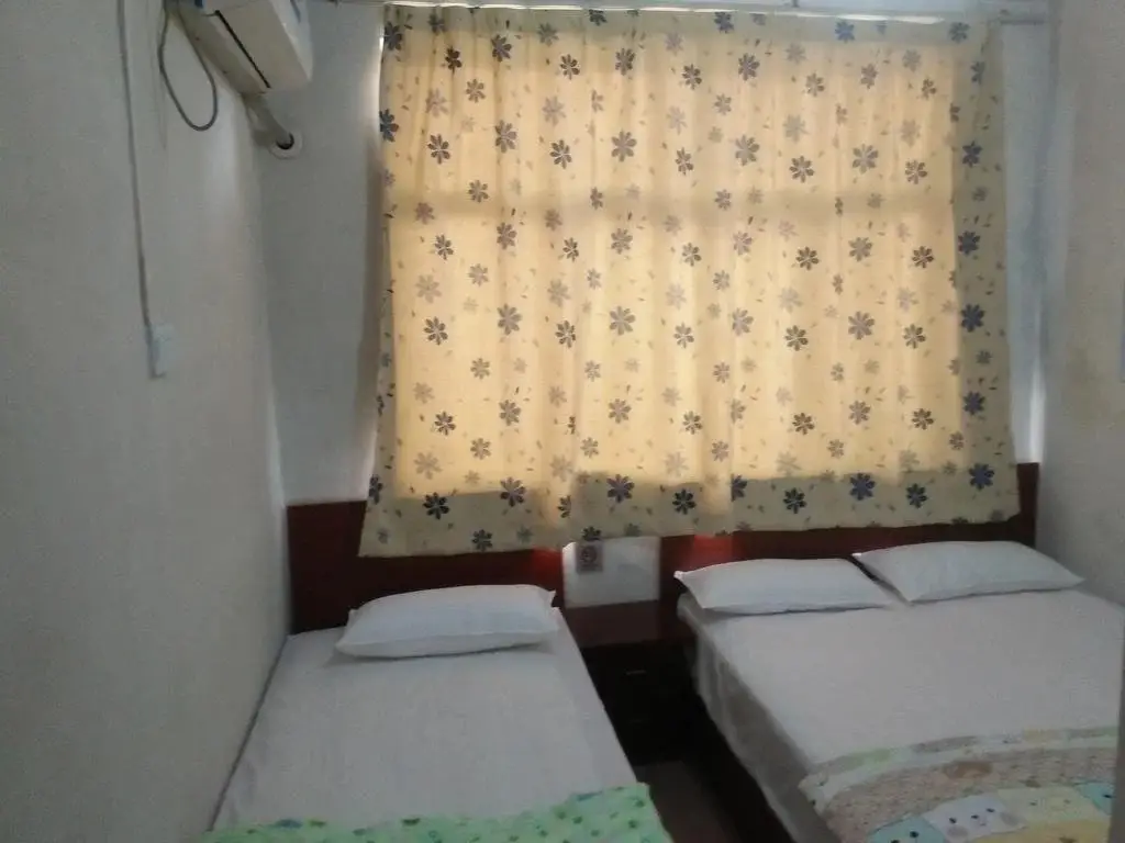 Жичжао: Sunshine fishing music Ren Jia Tai Cun Lan Su Hotel