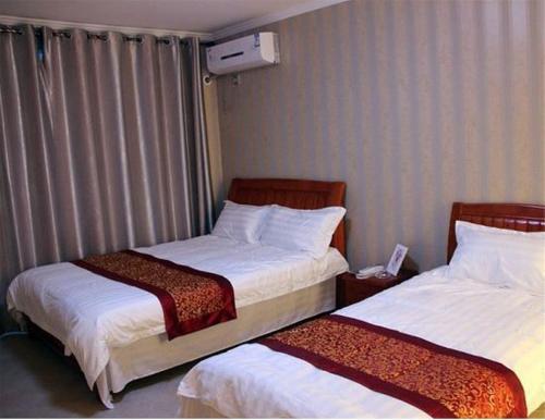Циньхуандао: Nandaihe Zilanxiangjun Seaview Apartment