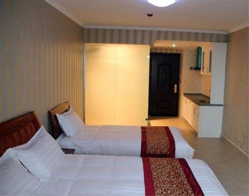 Циньхуандао: Nandaihe Zilanxiangjun Seaview Apartment