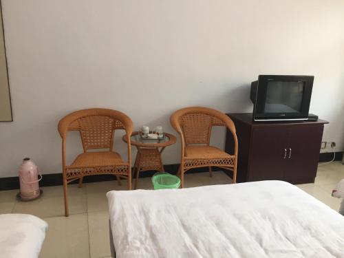 Синьчжоу: Wutaishan Caosijiegou Haoyunlai Farm Stay