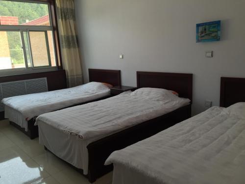 Синьчжоу: Wutaishan Caosijiegou Haoyunlai Farm Stay