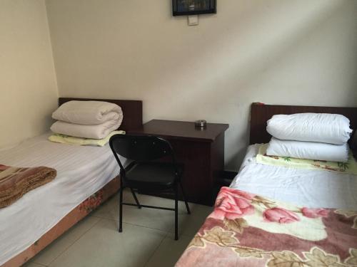 Синьчжоу: Wutaishan Caosijiegou Haoyunlai Farm Stay
