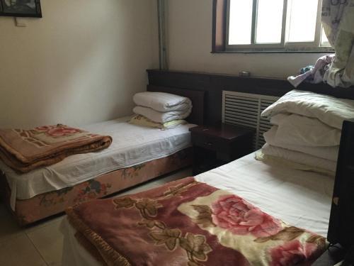 Синьчжоу: Wutaishan Caosijiegou Haoyunlai Farm Stay