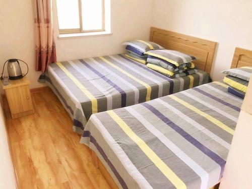 Циндао: Qingdao Phoenix Island Holiday Hotel Hai'an Fengqing Branch