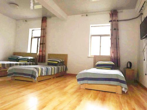 Циндао: Qingdao Phoenix Island Holiday Hotel Hai'an Fengqing Branch
