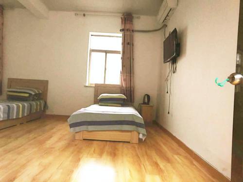 Циндао: Qingdao Phoenix Island Holiday Hotel Hai'an Fengqing Branch