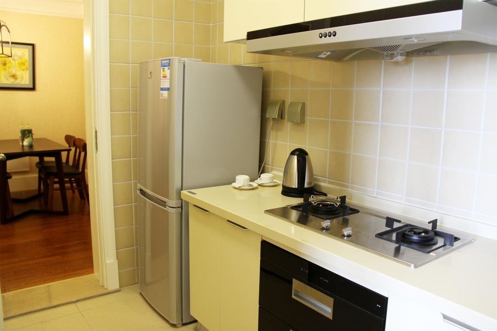 Циндао: Fuying Gailo Qingdao International Hotel Apartment