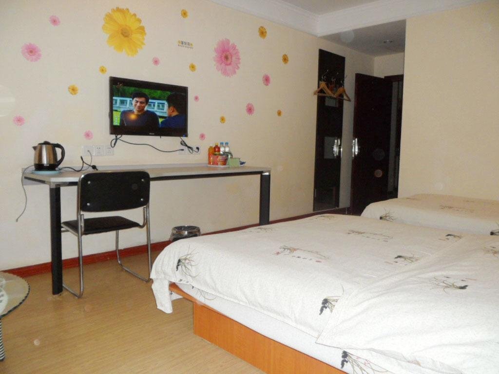 Циндао: Jinkailai Business Hotel - Qingdao