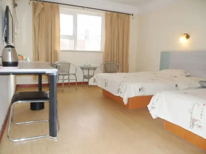 Циндао: Jinkailai Business Hotel - Qingdao