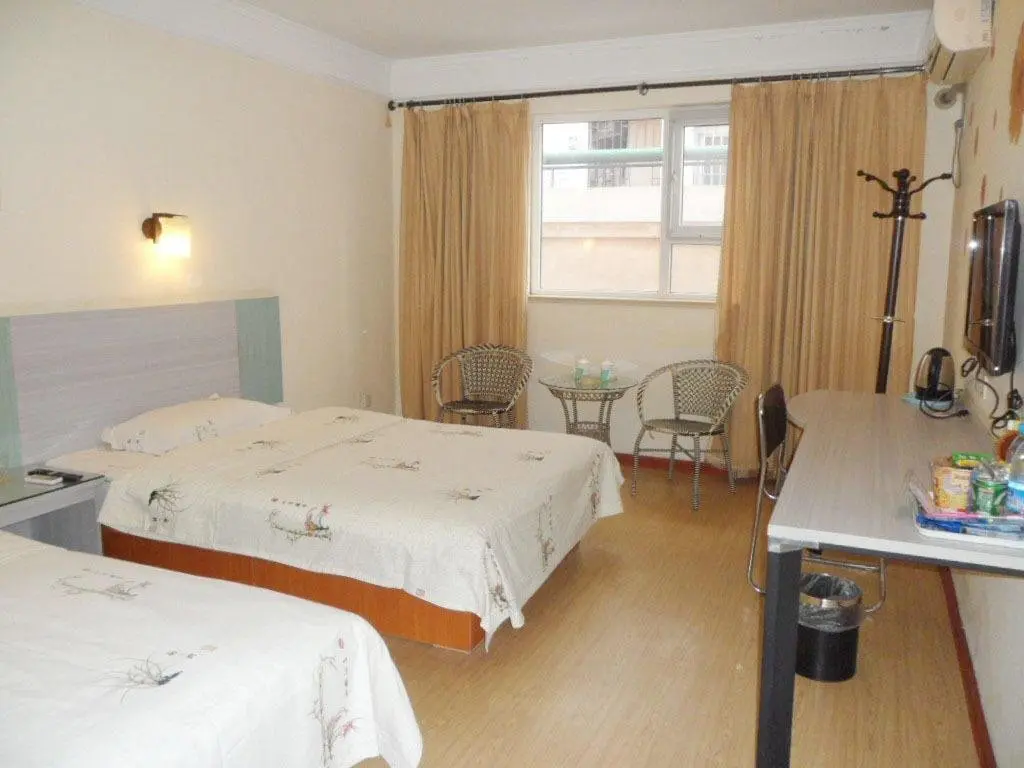 Циндао: Jinkailai Business Hotel - Qingdao