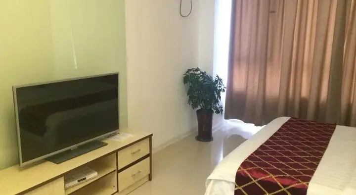 Циндао: Wanda Gold Dragon Holiday Apartment