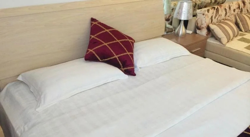 Циндао: Wanda Gold Dragon Holiday Apartment