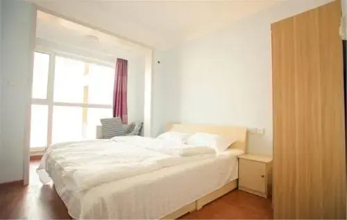 Циндао: Qingdao West Coast Jinshatan Family Inn