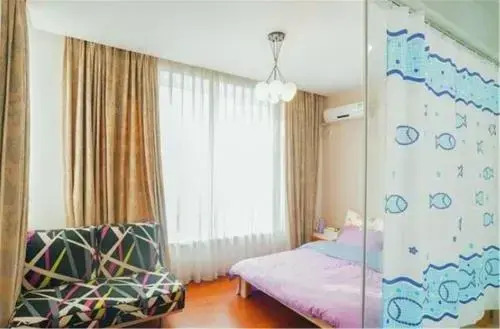 Циндао: Qingdao West Coast Jinshatan Family Inn