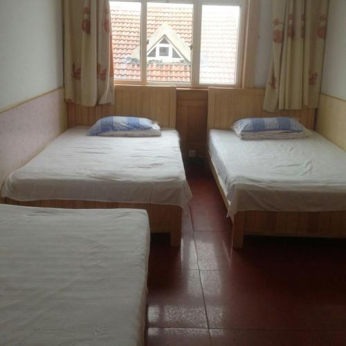 Циндао: Laoshan Shengyoujia Guesthouse Qingdao
