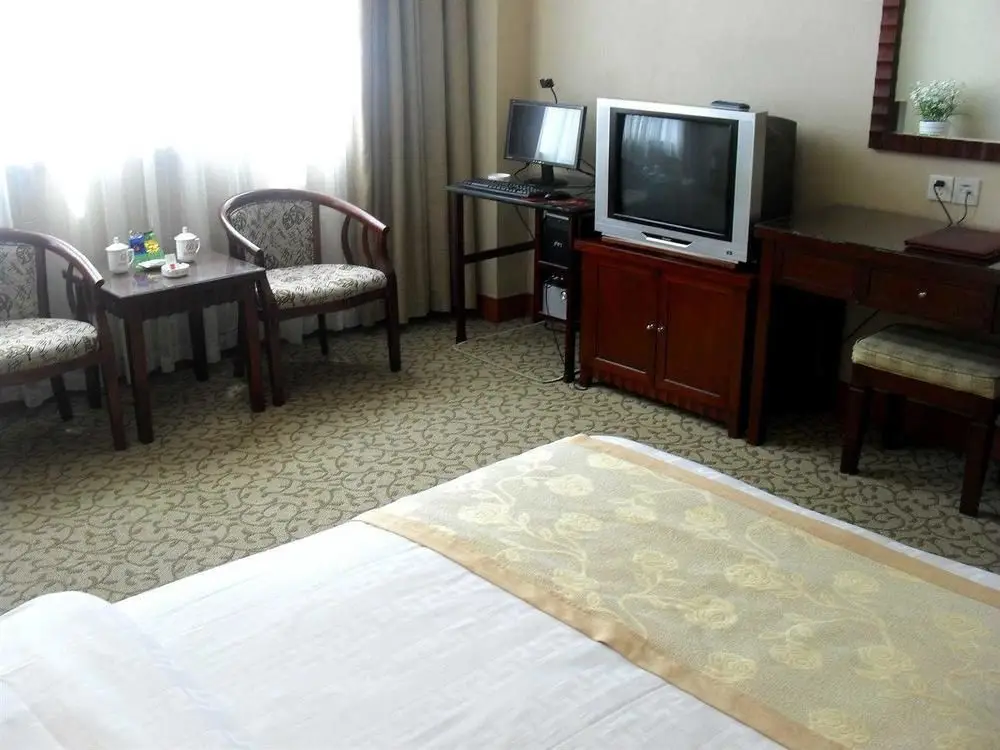 Линьи: Yonghe Business Hotel