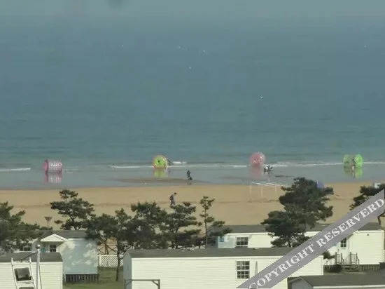 Циндао: Qingdao Jinshatan Yawen Seaview Guesthouse