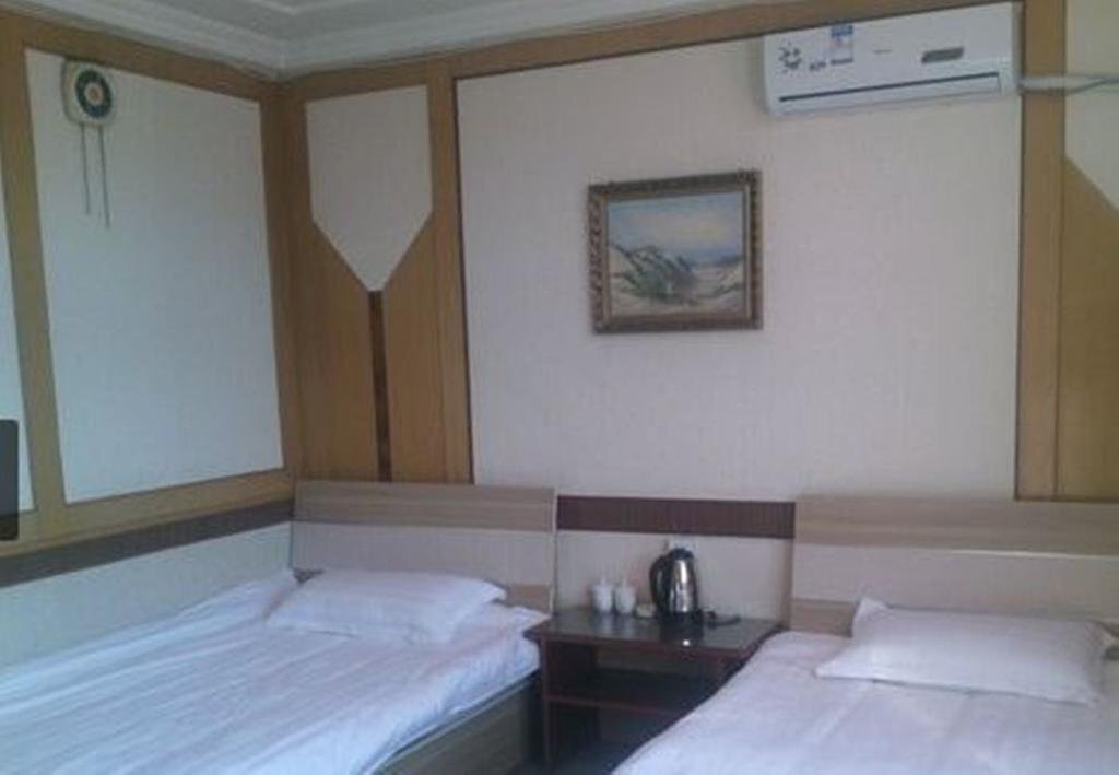 Циндао: Qingdao Yunxin Business Hotel