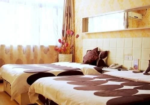 Циндао: Qingdao Yijia 99 Hotel