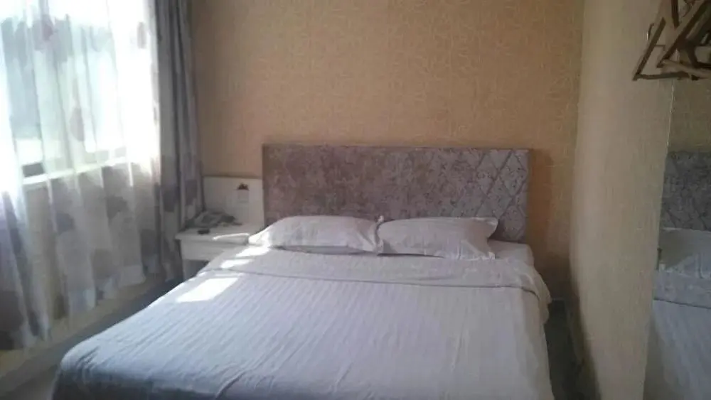 Циндао: Qingdao Yijia 99 Hotel