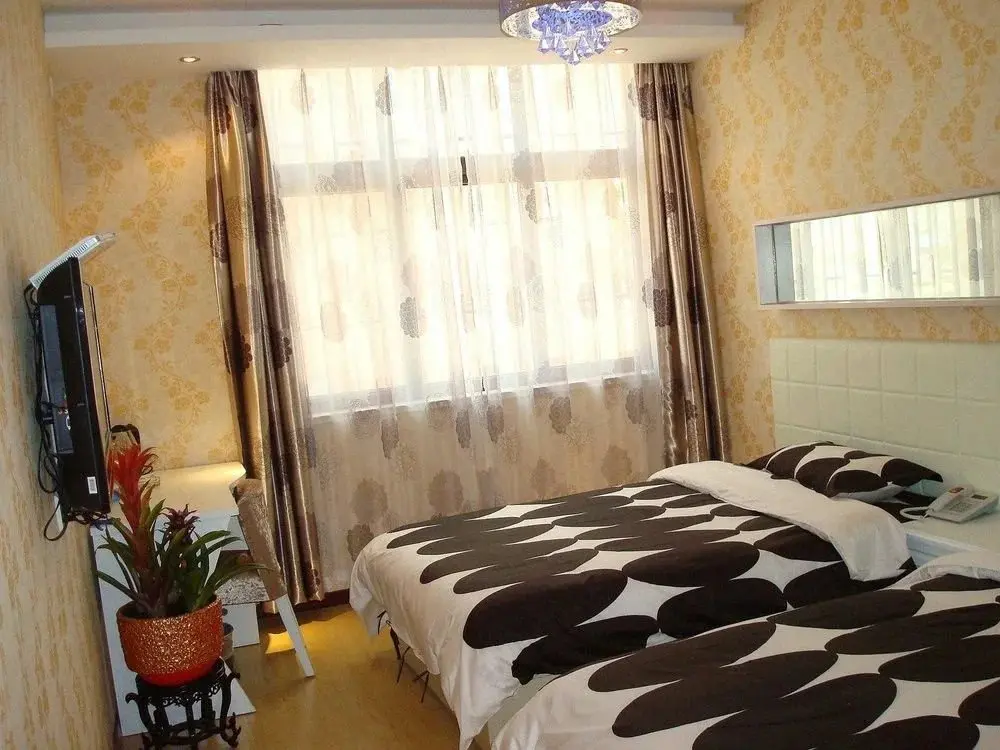 Циндао: Qingdao Yijia 99 Hotel