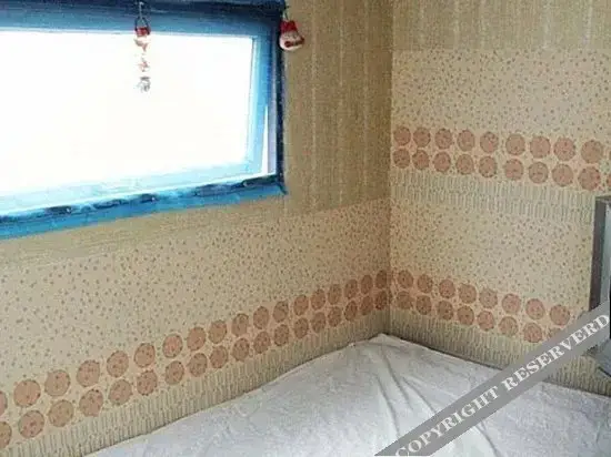 Циндао: Qingdao Chengruixiang Inn